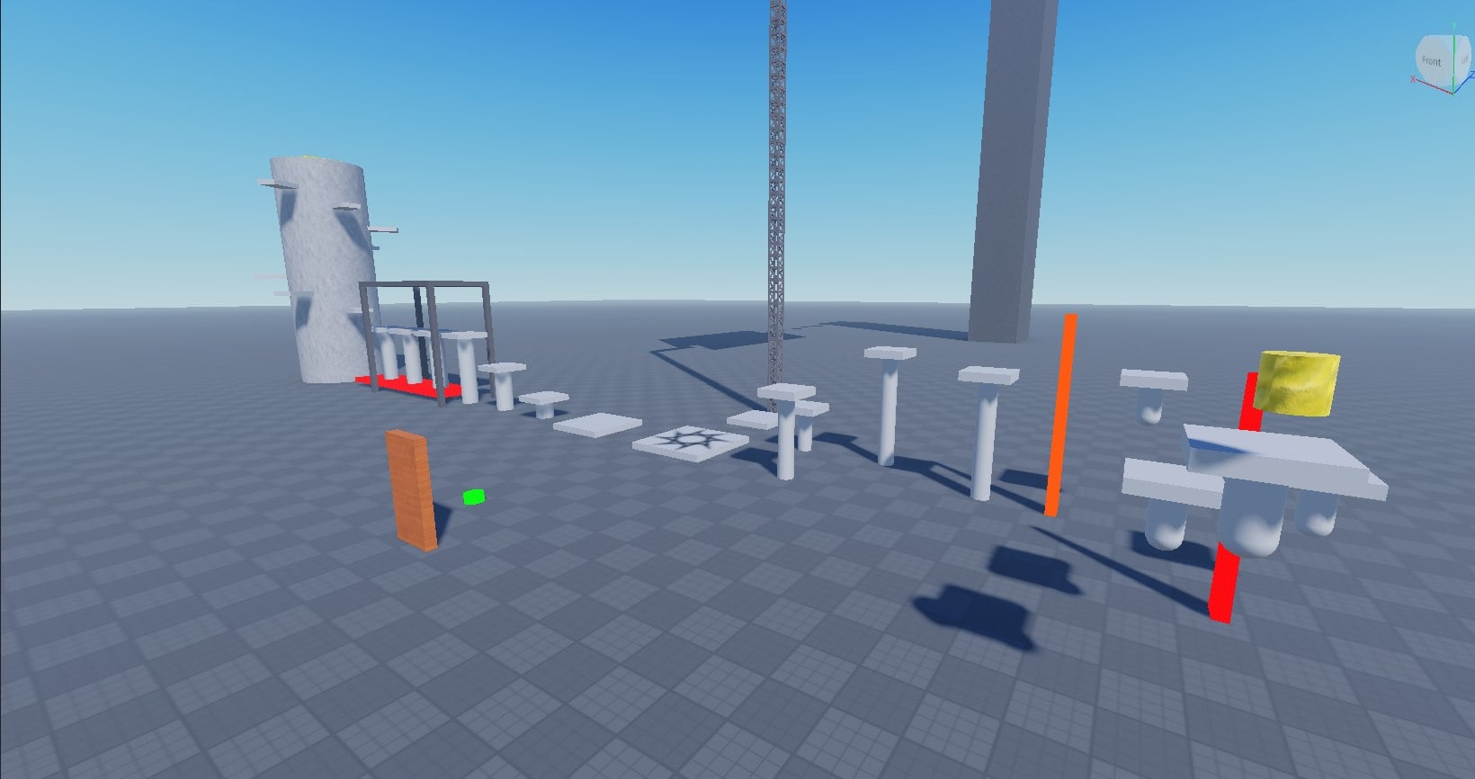 Roblox Studio viewport showing an in-progress obstacle course of floating platforms, pillars, and hazard markers